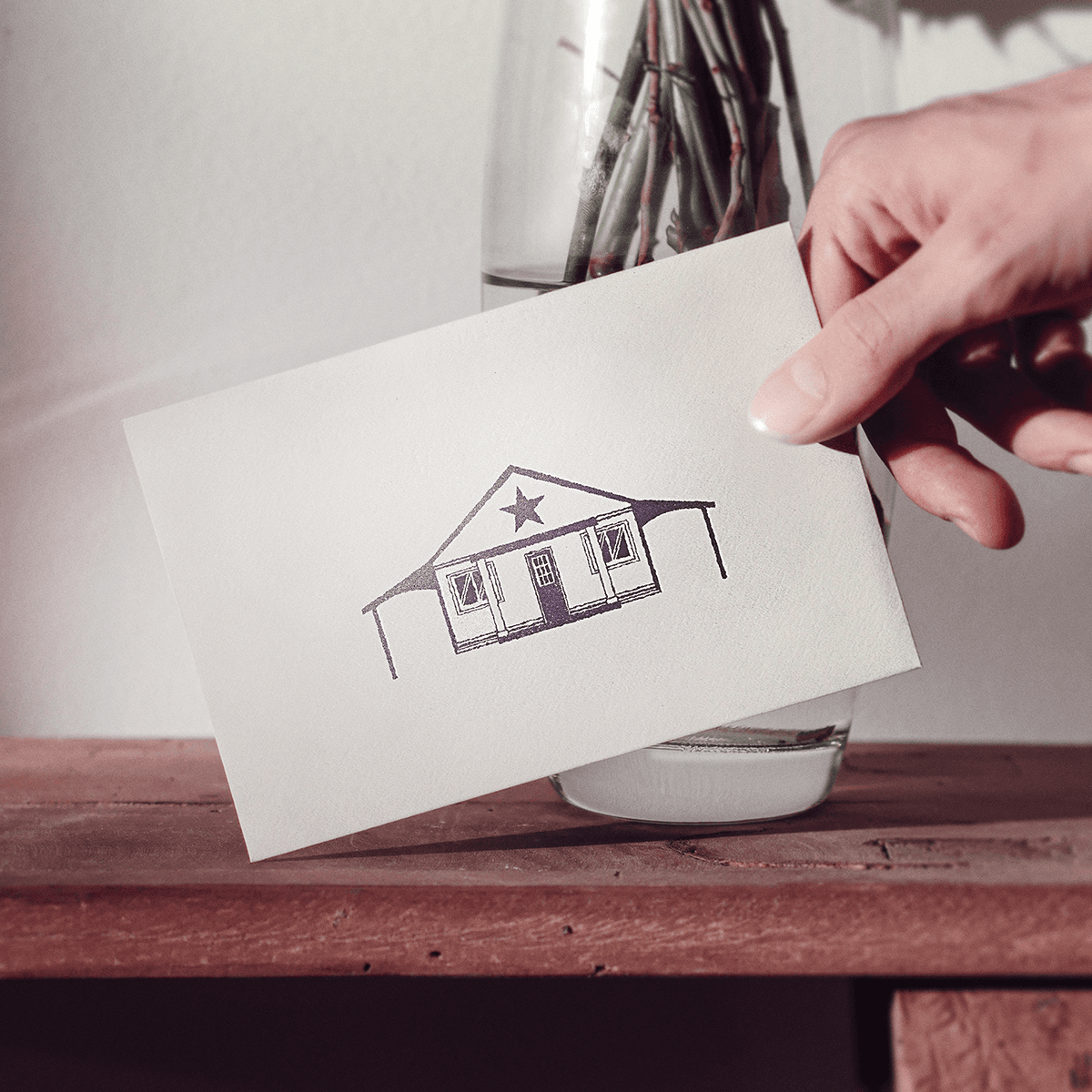 Ink stamp logo for Purple Door Studio brand design, brand kit, and style guide guidelines.